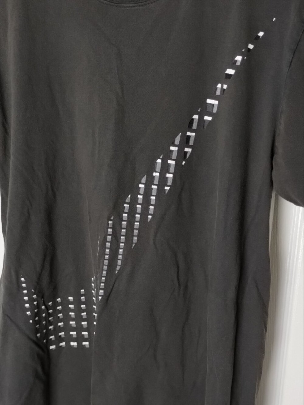 Nike Black Short-Sleeve Tee with Silver Swoosh Cutout.Large - Picture 7 of 8